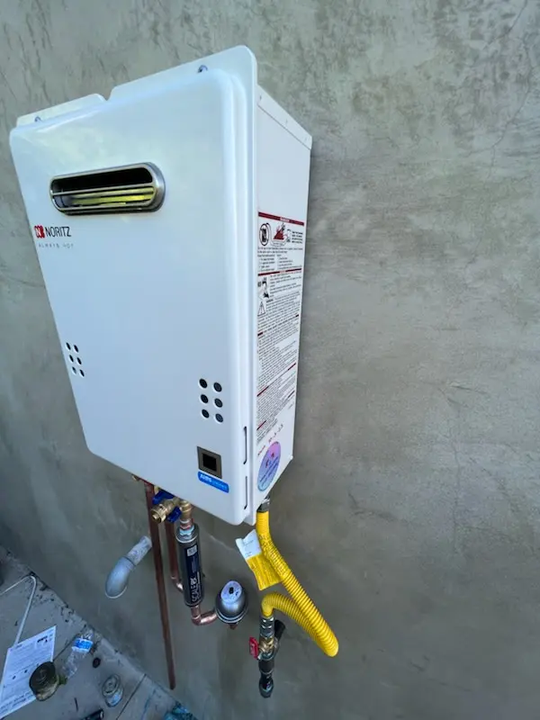 Tankless water heater installation for Loretto homes